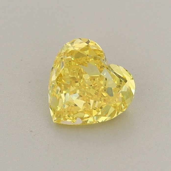 Loose Diamond - HEART 0.5ct Fancy Vivid Yellow SI1: Loose Diamond - HEART 0.5ct Fancy Vivid Yellow SI1 Source: This is a real non-mined Diamond that has been grown in a lab Shape: HEART Carats: 0.5 Color: Fancy Vivid Yellow Certification: IGI Video: