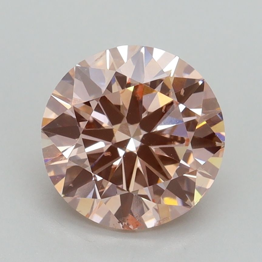 Loose Diamond - ROUND 2.0ct Fancy Intense Pink SI2: Loose Diamond - ROUND 2.0ct Fancy Intense Pink SI2 Source: This is a real non-mined Diamond that has been grown in a lab Shape: ROUND Carats: 2.0 Color: Fancy Intense Pink Certification: IGI Video: