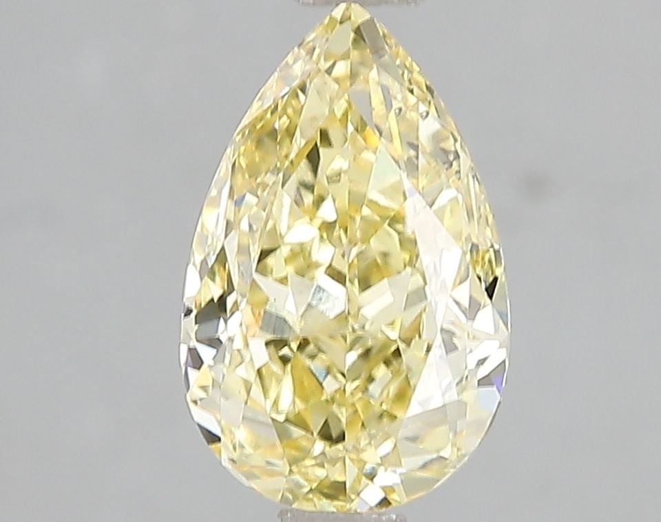 Loose Diamond - PEAR 2.0ct Fancy Vivid Yellow SI1: Loose Diamond - PEAR 2.0ct Fancy Vivid Yellow SI1 Source: This is a real non-mined Diamond that has been grown in a lab Shape: PEAR Carats: 2.0 Color: Fancy Vivid Yellow Certification: IGI Video: