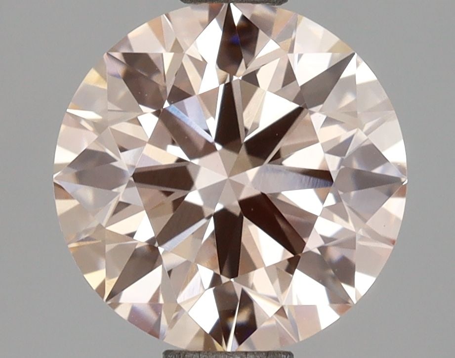 Ideal Loose Diamond - ROUND 2.07ct Fancy Pink VVS2: Ideal Loose Diamond - ROUND 2.07ct Fancy Pink VVS2 Source: This is a real non-mined Diamond that has been grown in a lab Shape: ROUND Carats: 2.07 Color: Fancy Pink Certification: IGI Video: