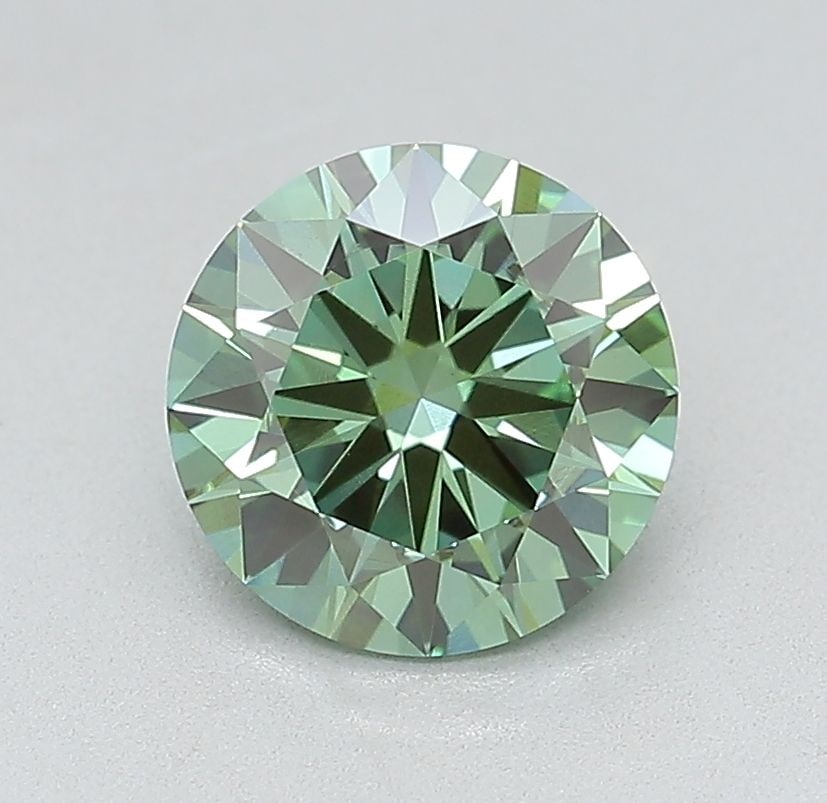 Loose Diamond - ROUND 1.4ct Fancy Vivid Green VVS2: Loose Diamond - ROUND 1.4ct Fancy Vivid Green VVS2 Source: This is a real non-mined Diamond that has been grown in a lab Shape: ROUND Carats: 1.4 Color: Fancy Vivid Green Certification: IGI Video: