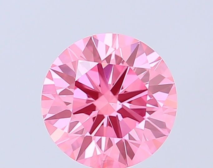 Ideal Loose Diamond - ROUND 0.97ct Fancy Vivid Pink VS1: Ideal Loose Diamond - ROUND 0.97ct Fancy Vivid Pink VS1 Source: This is a real non-mined Diamond that has been grown in a lab Shape: ROUND Carats: 0.97 Color: Fancy Vivid Pink Certification: IGI Video