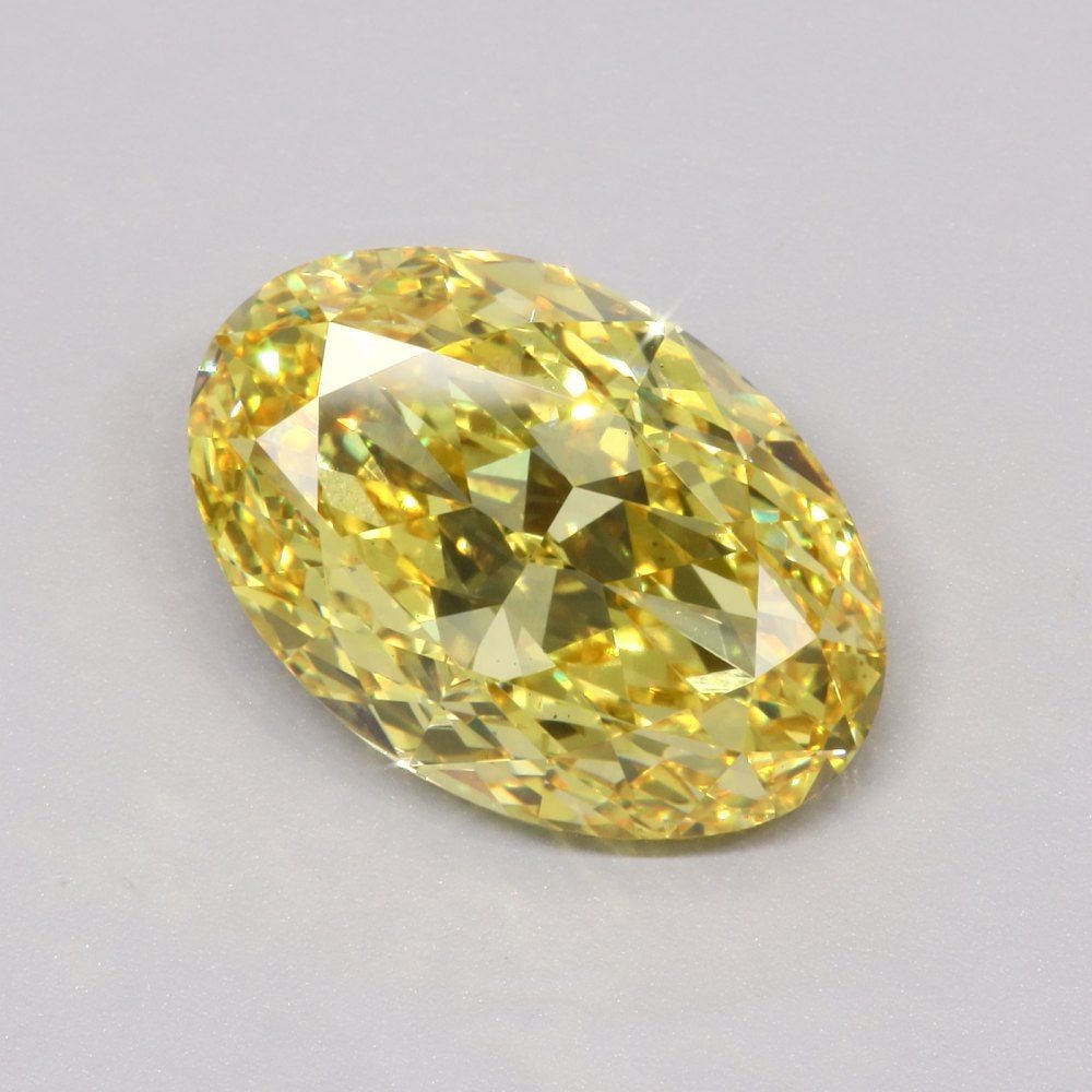 Loose Diamond - OVAL 8.03ct Fancy Vivid Yellow VS1: Loose Diamond - OVAL 8.03ct Fancy Vivid Yellow VS1 Source: This is a real non-mined Diamond that has been grown in a lab Shape: OVAL Carats: 8.03 Color: Fancy Vivid Yellow Certification: IGI Video: