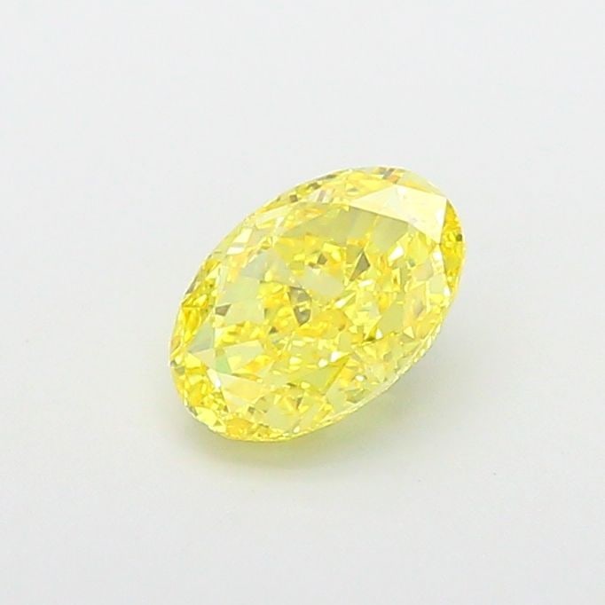 Loose Diamond - OVAL 1.52ct Fancy Vivid Yellow VS1: Loose Diamond - OVAL 1.52ct Fancy Vivid Yellow VS1 Source: This is a real non-mined Diamond that has been grown in a lab Shape: OVAL Carats: 1.52 Color: Fancy Vivid Yellow Certification: IGI Video: