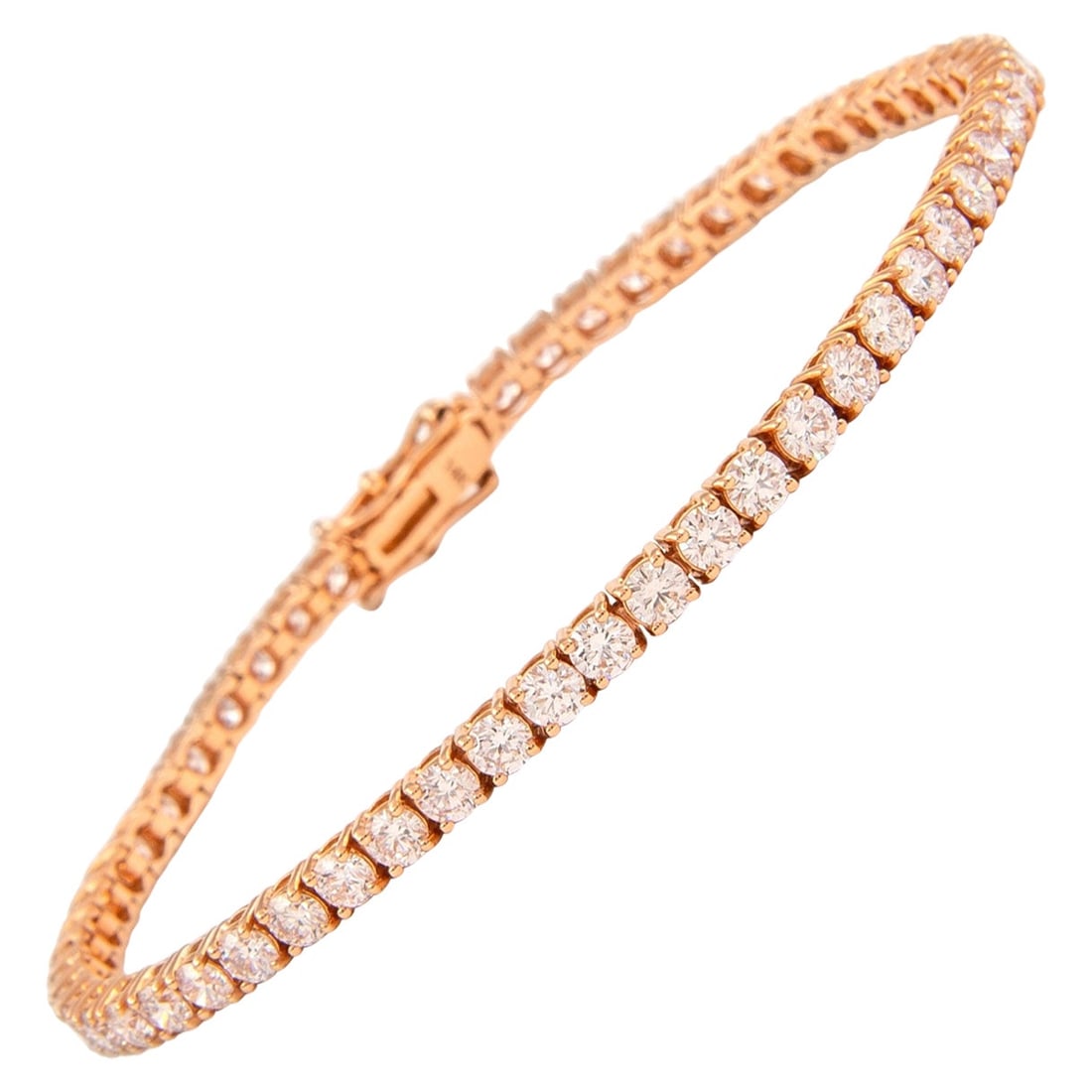 14k Rose Gold 5.62ct Diamond Tennis Bracelet: 14k Rose Gold 5.62ct Diamond Tennis Bracelet Diamond tennis bracelet set with 57 round brilliant diamonds totaling 5.62 ct. The diamonds are approximately F/G color and VS2/SI1 clarity, four-prong set