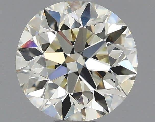 Loose Diamond - ROUND 0.7ct M VVS2: Loose Diamond - ROUND 0.7ct M VVS2 Source: Natural Shape: ROUND Carats: 0.7 Color: M Clarity: VVS2 Certification: GIA Video: