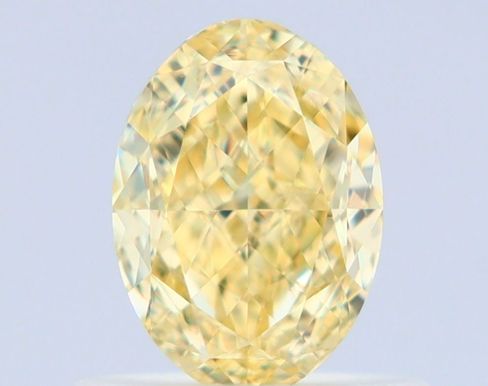Loose Diamond - OVAL 0.7ct Fancy Yellow VS1: Loose Diamond - OVAL 0.7ct Fancy Yellow VS1 Source: Natural Shape: OVAL Carats: 0.7 Color: Fancy Yellow Certification: GIA Video: