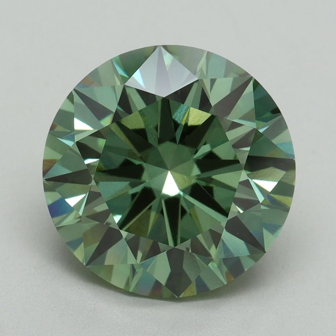 Ideal Loose Diamond - ROUND 5.18ct Fancy Vivid Green VVS2: Ideal Loose Diamond - ROUND 5.18ct Fancy Vivid Green VVS2 Source: This is a real non-mined Diamond that has been grown in a lab Shape: ROUND Carats: 5.18 Color: Fancy Vivid Green Certification: IGI Vi