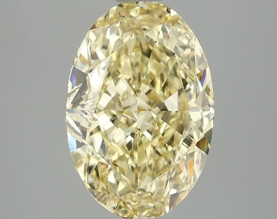 Loose Diamond - OVAL 3.1ct Fancy Intense Yellow VVS2: Loose Diamond - OVAL 3.1ct Fancy Intense Yellow VVS2 Source: This is a real non-mined Diamond that has been grown in a lab Shape: OVAL Carats: 3.1 Color: Fancy Intense Yellow Certification: IGI Video:
