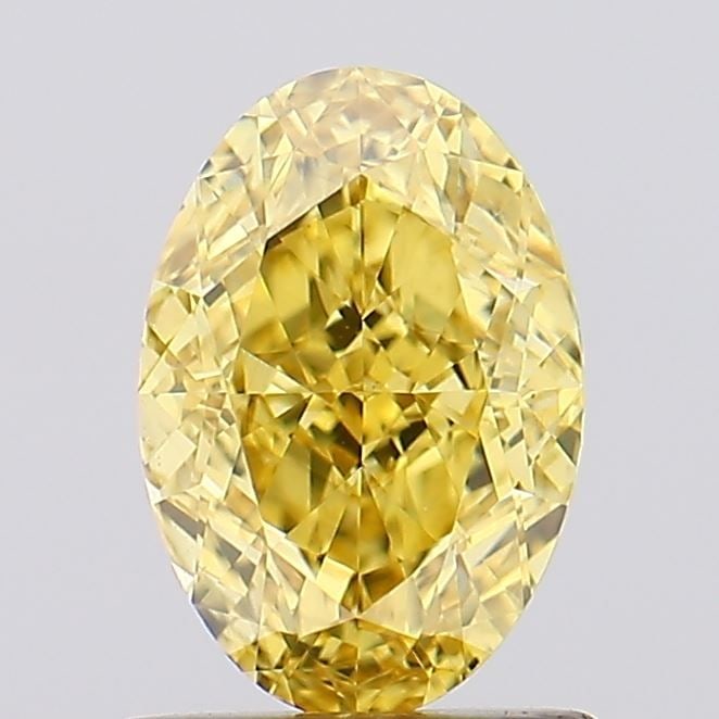 Loose Diamond - OVAL 1.17ct Fancy Vivid Yellow VS1: Loose Diamond - OVAL 1.17ct Fancy Vivid Yellow VS1 Source: This is a real non-mined Diamond that has been grown in a lab Shape: OVAL Carats: 1.17 Color: Fancy Vivid Yellow Certification: IGI Video: