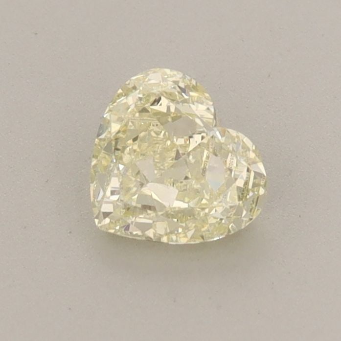 Loose Diamond - HEART 0.55ct Fancy Light Yellow VVS2: Loose Diamond - HEART 0.55ct Fancy Light Yellow VVS2 Source: This is a real non-mined Diamond that has been grown in a lab Shape: HEART Carats: 0.55 Color: Fancy Light Yellow Certification: IGI Video:
