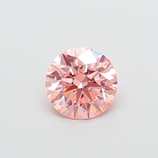 Ideal Loose Diamond - ROUND 1.19ct Fancy Vivid Pink VS1: Ideal Loose Diamond - ROUND 1.19ct Fancy Vivid Pink VS1 Source: This is a real non-mined Diamond that has been grown in a lab Shape: ROUND Carats: 1.19 Color: Fancy Vivid Pink Certification: IGI Video