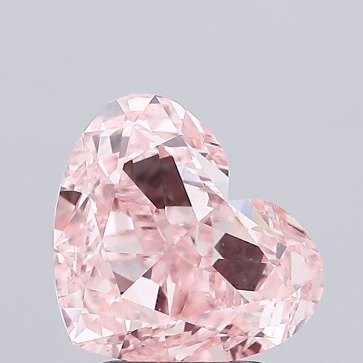 Loose Diamond - HEART 3.0ct Fancy Vivid Pink VS1: Loose Diamond - HEART 3.0ct Fancy Vivid Pink VS1 Source: This is a real non-mined Diamond that has been grown in a lab Shape: HEART Carats: 3.0 Color: Fancy Vivid Pink Certification: IGI Video: