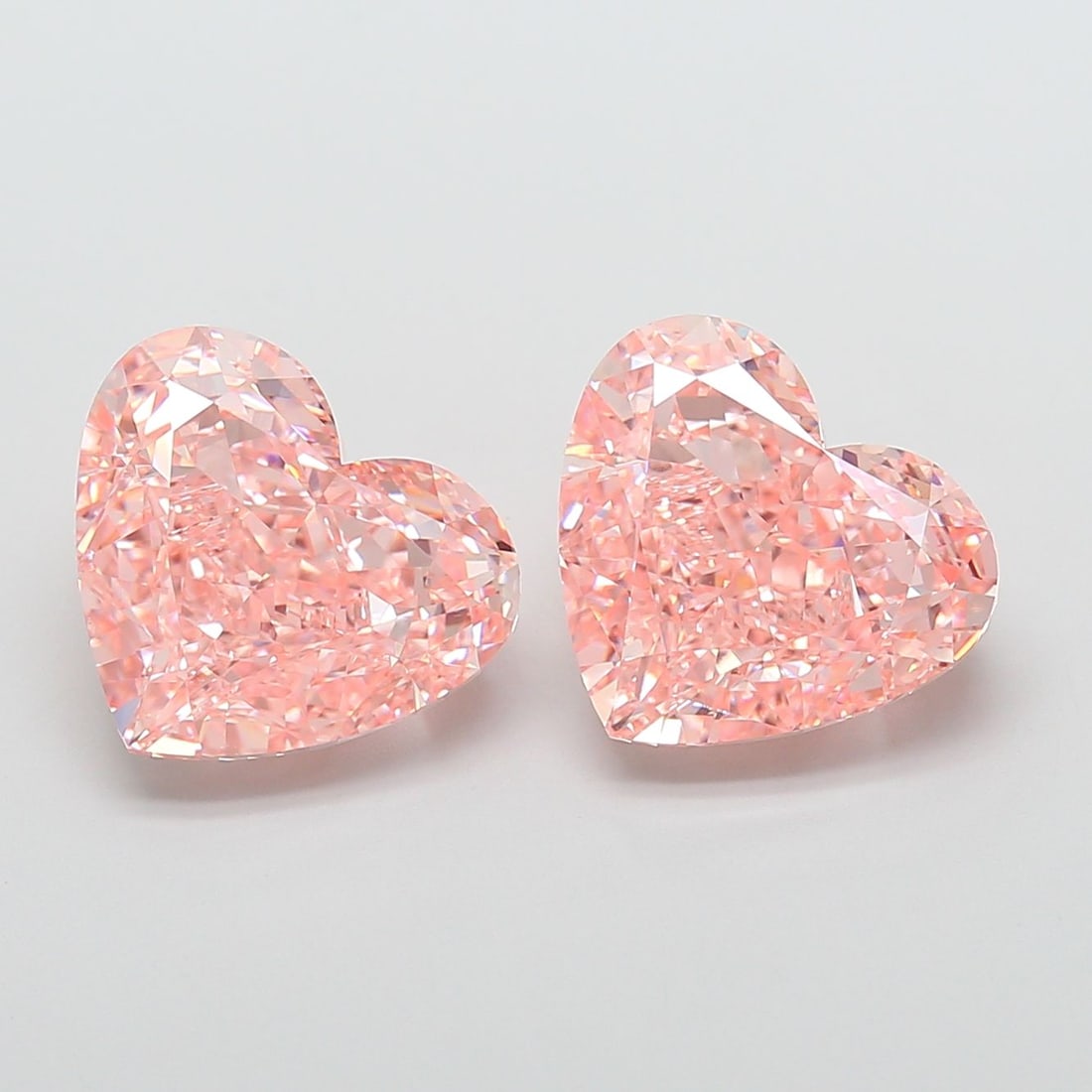 Loose Diamond - HEART 7.06ct Fancy Vivid Pink VVS2: Loose Diamond - HEART 7.06ct Fancy Vivid Pink VVS2 Source: This is a real non-mined Diamond that has been grown in a lab Shape: HEART Carats: 7.06 Color: Fancy Vivid Pink Certification: IGI Video: