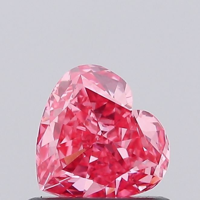 Loose Diamond - HEART 0.63ct Fancy Vivid Pink VVS2: Loose Diamond - HEART 0.63ct Fancy Vivid Pink VVS2 Source: This is a real non-mined Diamond that has been grown in a lab Shape: HEART Carats: 0.63 Color: Fancy Vivid Pink Certification: IGI Video: