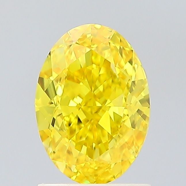 Loose Diamond - OVAL 1.65ct Fancy Vivid Yellow VS1: Loose Diamond - OVAL 1.65ct Fancy Vivid Yellow VS1 Source: This is a real non-mined Diamond that has been grown in a lab Shape: OVAL Carats: 1.65 Color: Fancy Vivid Yellow Certification: IGI Video: