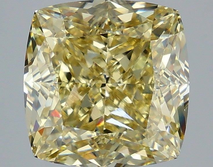 Loose Diamond - CUSHION MODIFIED 5.1ct Fancy Yellow VVS2: Loose Diamond - CUSHION MODIFIED 5.1ct Fancy Yellow VVS2 Source: This is a real non-mined Diamond that has been grown in a lab Shape: CUSHION MODIFIED Carats: 5.1 Color: Fancy Yellow Certification: IG