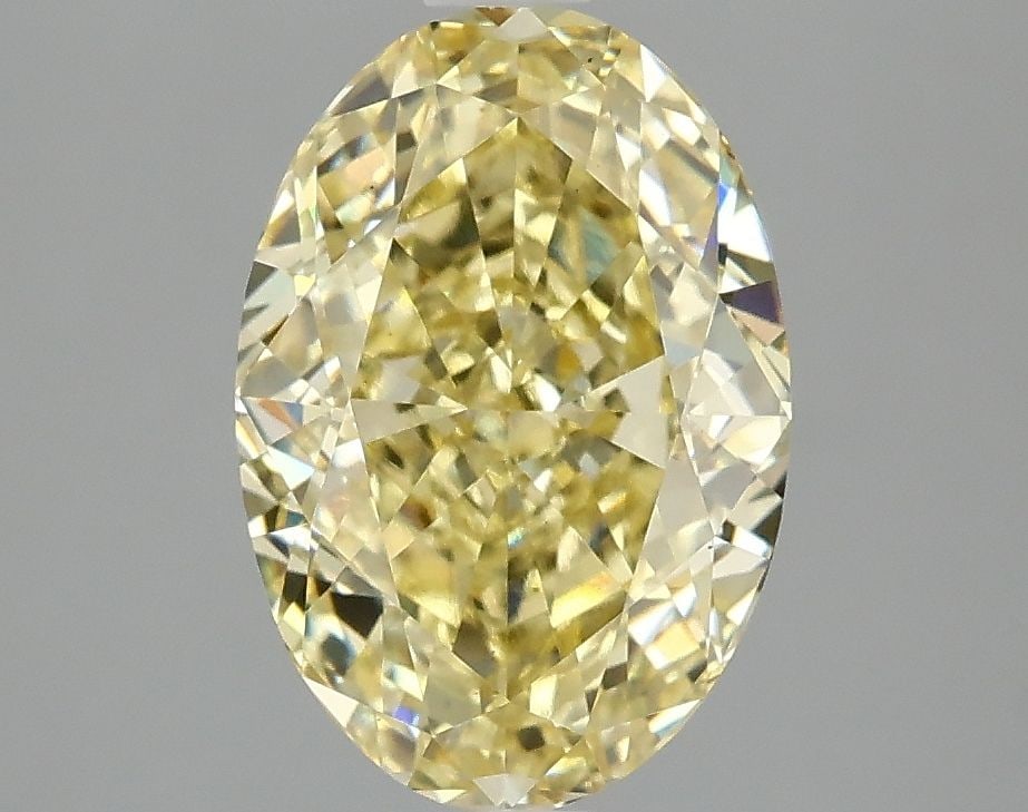 Loose Diamond - OVAL 3.06ct Fancy Intense Yellow VS1: Loose Diamond - OVAL 3.06ct Fancy Intense Yellow VS1 Source: This is a real non-mined Diamond that has been grown in a lab Shape: OVAL Carats: 3.06 Color: Fancy Intense Yellow Certification: IGI Video