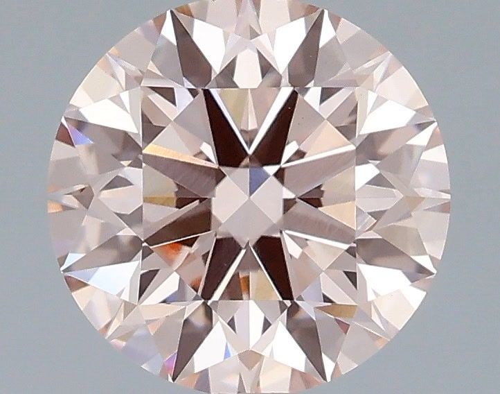 Ideal Loose Diamond - ROUND 2.04ct Fancy Pink VS1: Ideal Loose Diamond - ROUND 2.04ct Fancy Pink VS1 Source: This is a real non-mined Diamond that has been grown in a lab Shape: ROUND Carats: 2.04 Color: Fancy Pink Certification: IGI Video: