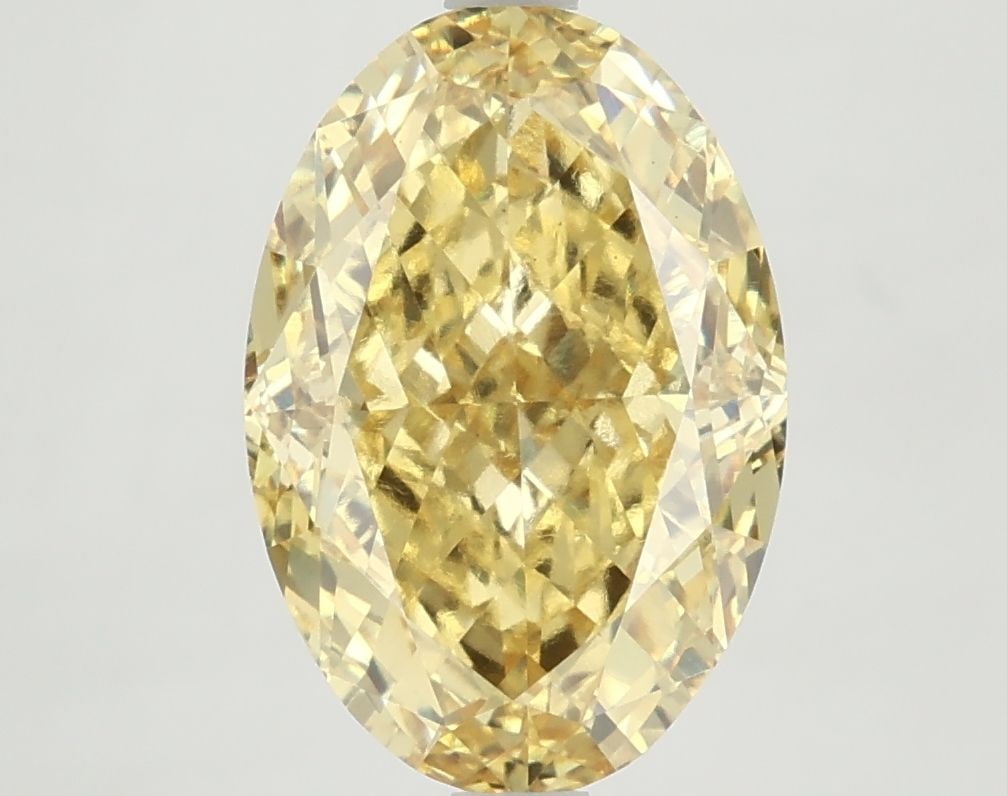 Loose Diamond - OVAL 5.14ct Fancy Vivid Yellow VS2: Loose Diamond - OVAL 5.14ct Fancy Vivid Yellow VS2 Source: This is a real non-mined Diamond that has been grown in a lab Shape: OVAL Carats: 5.14 Color: Fancy Vivid Yellow Certification: NONE Video: