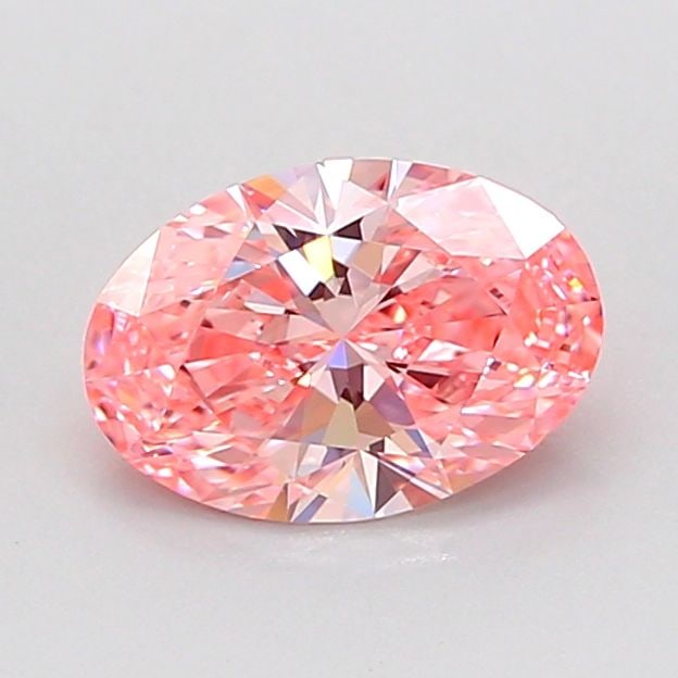 Loose Diamond - OVAL 0.9ct Fancy Vivid Pink VVS2: Loose Diamond - OVAL 0.9ct Fancy Vivid Pink VVS2 Source: This is a real non-mined Diamond that has been grown in a lab Shape: OVAL Carats: 0.9 Color: Fancy Vivid Pink Certification: IGI Video: