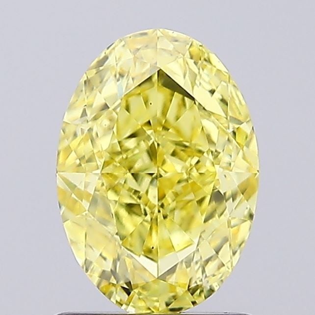 Loose Diamond - OVAL 1.37ct Fancy Vivid Yellow VS1: Loose Diamond - OVAL 1.37ct Fancy Vivid Yellow VS1 Source: This is a real non-mined Diamond that has been grown in a lab Shape: OVAL Carats: 1.37 Color: Fancy Vivid Yellow Certification: IGI Video: