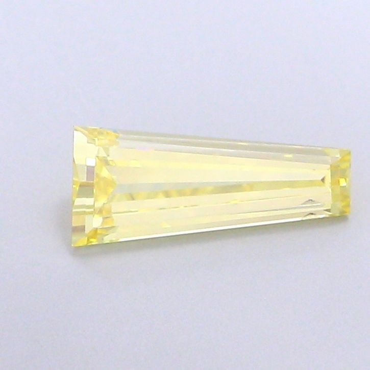 Loose Diamond - BAGUETTE 0.99ct Fancy Vivid Yellow VS2: Loose Diamond - BAGUETTE 0.99ct Fancy Vivid Yellow VS2 Source: This is a real non-mined Diamond that has been grown in a lab Shape: BAGUETTE Carats: 0.99 Color: Fancy Vivid Yellow Certification: NONE 
