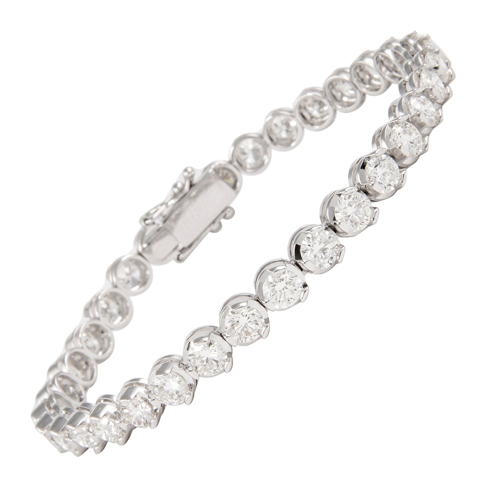 18k White Gold Diamond Tennis Bracelet 10.51ct: 18k White Gold Diamond Tennis Bracelet 10.51ct Diamond tennis bracelet set with 33 round brilliant diamonds totaling 10.51 ct in 18k white gold. The diamonds are approximately G-I color and VS2/SI1 cl