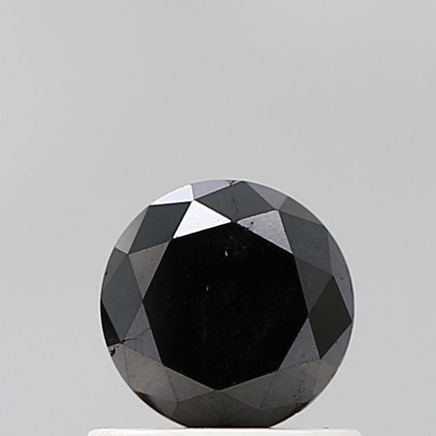 Loose Diamond - ROUND 0.75ct Black VS1: Loose Diamond - ROUND 0.75ct Black VS1 Source: Natural Shape: ROUND Carats: 0.75 Color: Black Certification: NONE Video: Video Link The Diamond Depot Guarantee: All items in this auction are