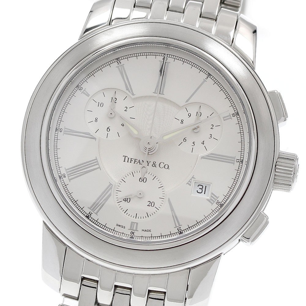 Tiffany Co Mark Mens Quartz Chronograph Wristwatch Date Stainless Steel: Tiffany Co Mark Mens Quartz Chronograph Wristwatch Date Stainless Steel Tiffany & Co. Mark men's wristwatch with a quartz movement, silver dial, and stainless steel case and bracelet. This chronograph