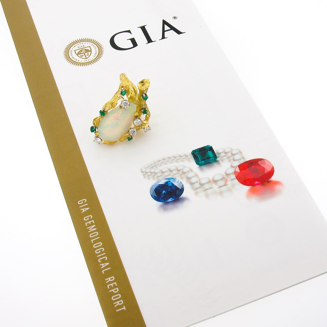 Vintage 18k Gold GIA Certified Pear Opal Diamond Emerald Bark Ring: Vintage 18k Gold GIA Certified Pear Opal Diamond Emerald Bark Ring This exquisite vintage cocktail ring is crafted from solid 18k yellow gold and features a stunning pear cabochon opal at its center, 