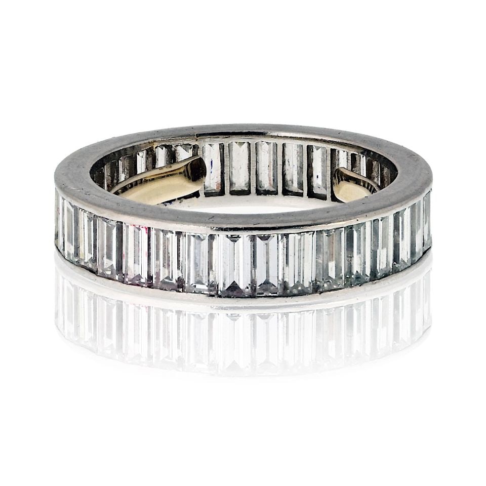 Vintage Platinum Eternity Band with 3 Ct Baguette Diamonds Size 5.5: Vintage Platinum Eternity Band with 3 Ct Baguette Diamonds Size 5.5 Vintage platinum eternity band set with baguette-cut diamonds in a sleek channel setting. This pre-owned ring offers a bold, timeles