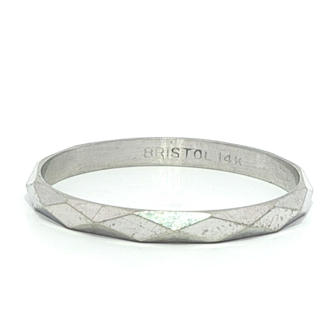Antique Art Deco 14k White Gold Faceted Stack Band Ring: Antique Art Deco 14k White Gold Faceted Stack Band Ring This exquisite Bristol Antique Art Deco stack band ring showcases a unique lozenge faceted pattern crafted from solid 14k white gold. Designed i