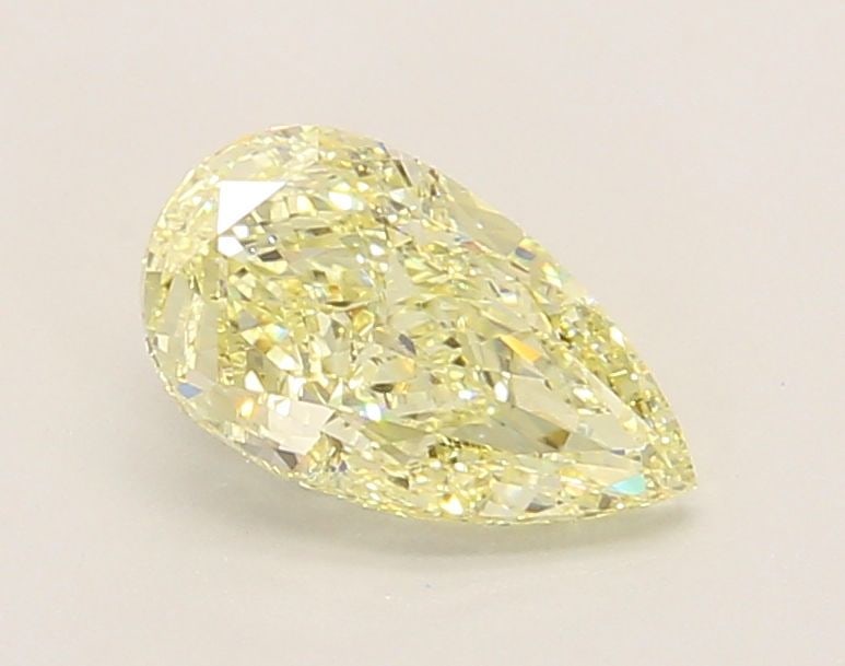 Loose Diamond - PEAR 1.25ct Fancy Light Yellow VVS2: Loose Diamond - PEAR 1.25ct Fancy Light Yellow VVS2 Source: This is a real non-mined Diamond that has been grown in a lab Shape: PEAR Carats: 1.25 Color: Fancy Light Yellow Certification: IGI Video: