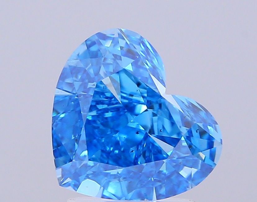 Loose Diamond - HEART 3.01ct Fancy Vivid Blue SI1: Loose Diamond - HEART 3.01ct Fancy Vivid Blue SI1 Source: This is a real non-mined Diamond that has been grown in a lab Shape: HEART Carats: 3.01 Color: Fancy Vivid Blue Certification: IGI Video: