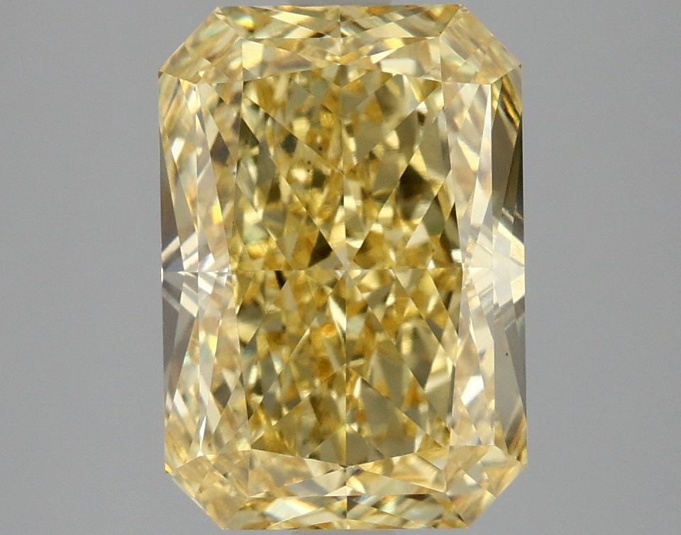 Loose Diamond - RADIANT 4.09ct Fancy Vivid Yellow VS2: Loose Diamond - RADIANT 4.09ct Fancy Vivid Yellow VS2 Source: This is a real non-mined Diamond that has been grown in a lab Shape: RADIANT Carats: 4.09 Color: Fancy Vivid Yellow Certification: IGI