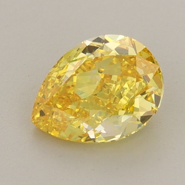 Loose Diamond - PEAR 1.34ct Fancy Vivid Yellow VVS1: Loose Diamond - PEAR 1.34ct Fancy Vivid Yellow VVS1 Source: This is a real non-mined Diamond that has been grown in a lab Shape: PEAR Carats: 1.34 Color: Fancy Vivid Yellow Certification: IGI Video: