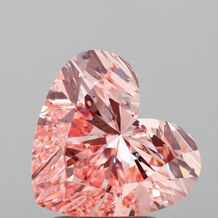 Loose Diamond - HEART 2.5ct Fancy Vivid Pink SI1: Loose Diamond - HEART 2.5ct Fancy Vivid Pink SI1 Source: This is a real non-mined Diamond that has been grown in a lab Shape: HEART Carats: 2.5 Color: Fancy Vivid Pink Certification: IGI Video: