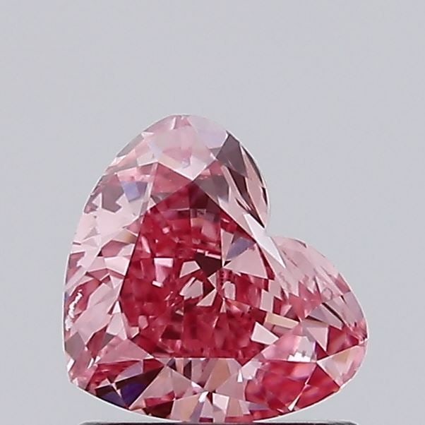 Loose Diamond - HEART 0.88ct Fancy Vivid Pink VS1: Loose Diamond - HEART 0.88ct Fancy Vivid Pink VS1 Source: This is a real non-mined Diamond that has been grown in a lab Shape: HEART Carats: 0.88 Color: Fancy Vivid Pink Certification: IGI Video:
