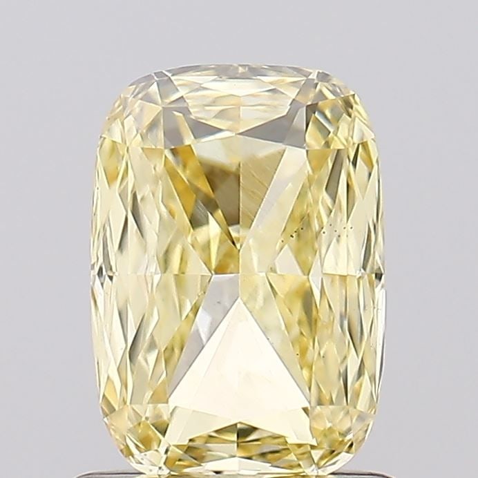 Loose Diamond - CUSHION MODIFIED 1.04ct Fancy Yellow VS1: Loose Diamond - CUSHION MODIFIED 1.04ct Fancy Yellow VS1 Source: This is a real non-mined Diamond that has been grown in a lab Shape: CUSHION MODIFIED Carats: 1.04 Color: Fancy Yellow Certification: I