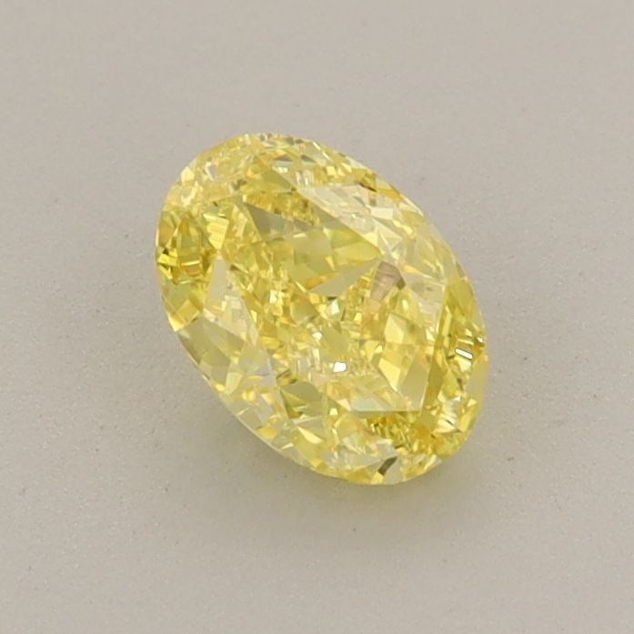 Loose Diamond - OVAL 0.61ct Fancy Vivid Yellow VVS2: Loose Diamond - OVAL 0.61ct Fancy Vivid Yellow VVS2 Source: This is a real non-mined Diamond that has been grown in a lab Shape: OVAL Carats: 0.61 Color: Fancy Vivid Yellow Certification: IGI Video: