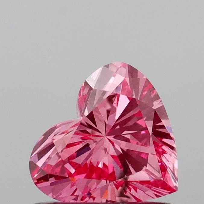 Loose Diamond - HEART 0.63ct Fancy Vivid Pink SI1: Loose Diamond - HEART 0.63ct Fancy Vivid Pink SI1 Source: This is a real non-mined Diamond that has been grown in a lab Shape: HEART Carats: 0.63 Color: Fancy Vivid Pink Certification: IGI Video: