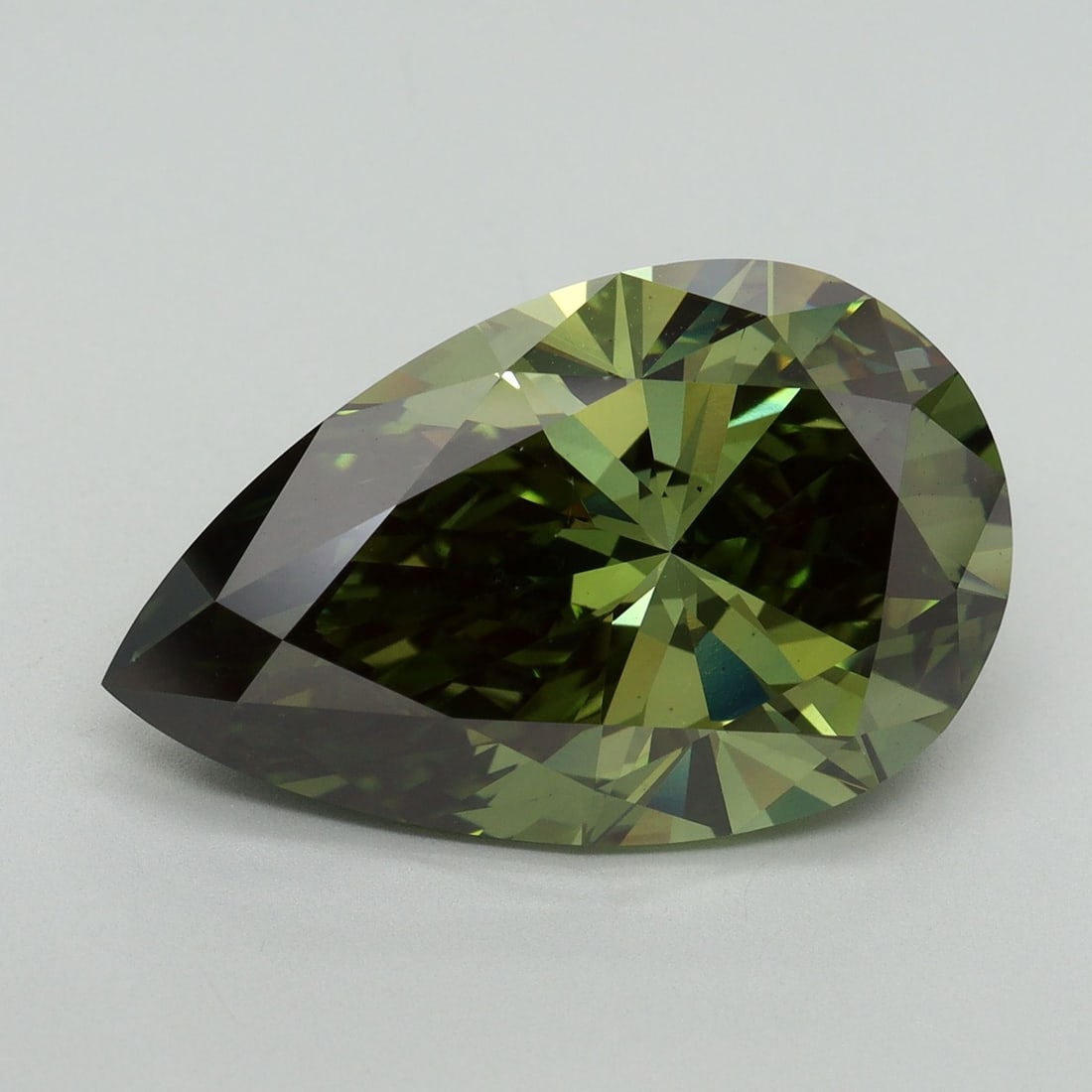 Loose Diamond - PEAR 9.36ct Fancy Vivid Green VS2: Loose Diamond - PEAR 9.36ct Fancy Vivid Green VS2 Source: This is a real non-mined Diamond that has been grown in a lab Shape: PEAR Carats: 9.36 Color: Fancy Vivid Green Certification: IGI Video: