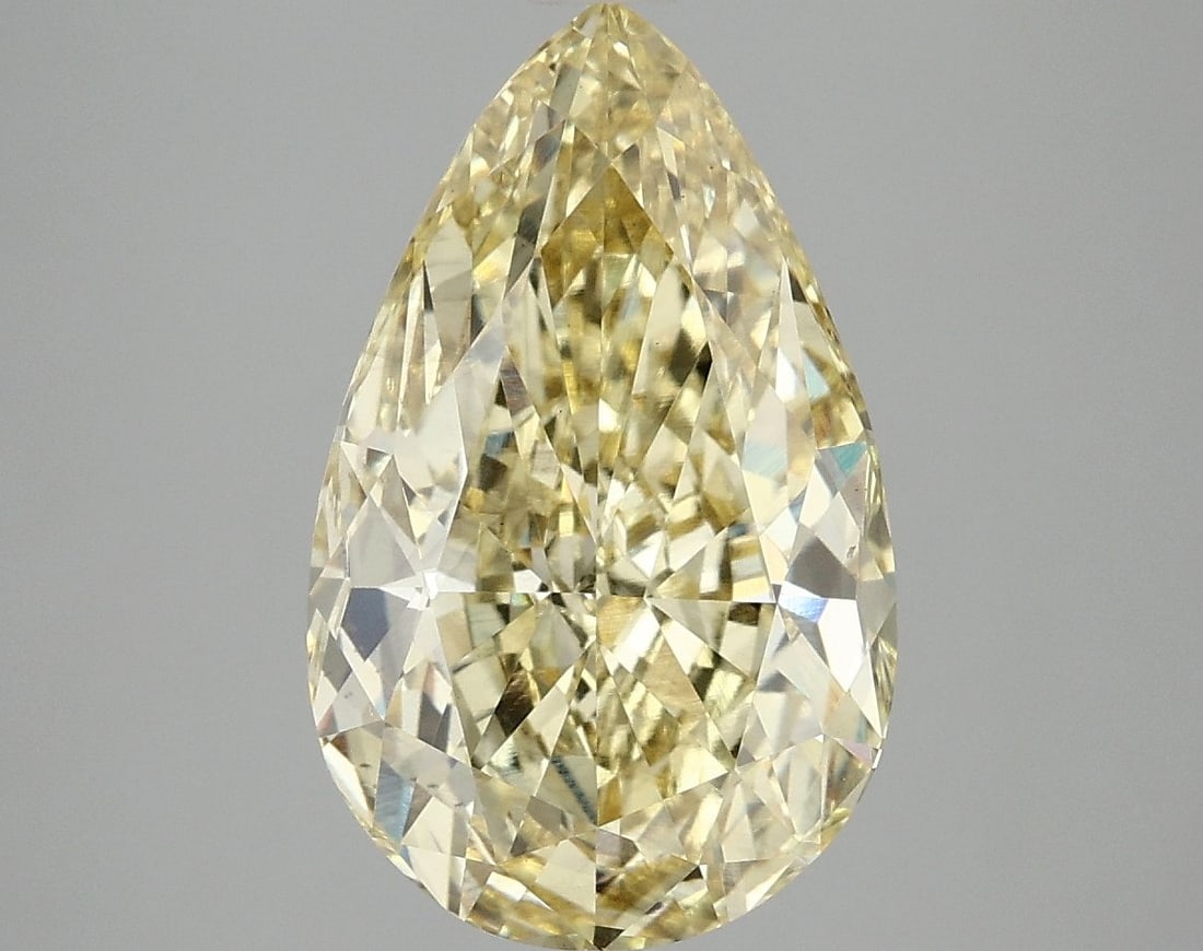 Loose Diamond - PEAR 5.06ct Fancy Vivid Yellow VS2: Loose Diamond - PEAR 5.06ct Fancy Vivid Yellow VS2 Source: This is a real non-mined Diamond that has been grown in a lab Shape: PEAR Carats: 5.06 Color: Fancy Vivid Yellow Certification: IGI Video: