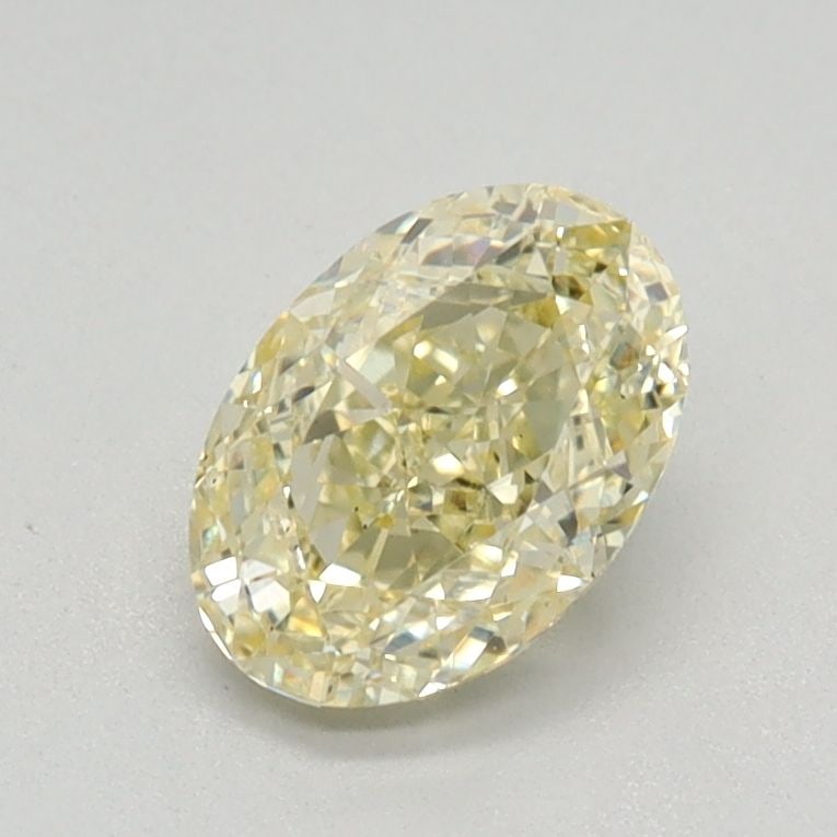 Loose Diamond - OVAL 0.77ct Fancy Yellow VS2: Loose Diamond - OVAL 0.77ct Fancy Yellow VS2 Source: This is a real non-mined Diamond that has been grown in a lab Shape: OVAL Carats: 0.77 Color: Fancy Yellow Certification: IGI Video: