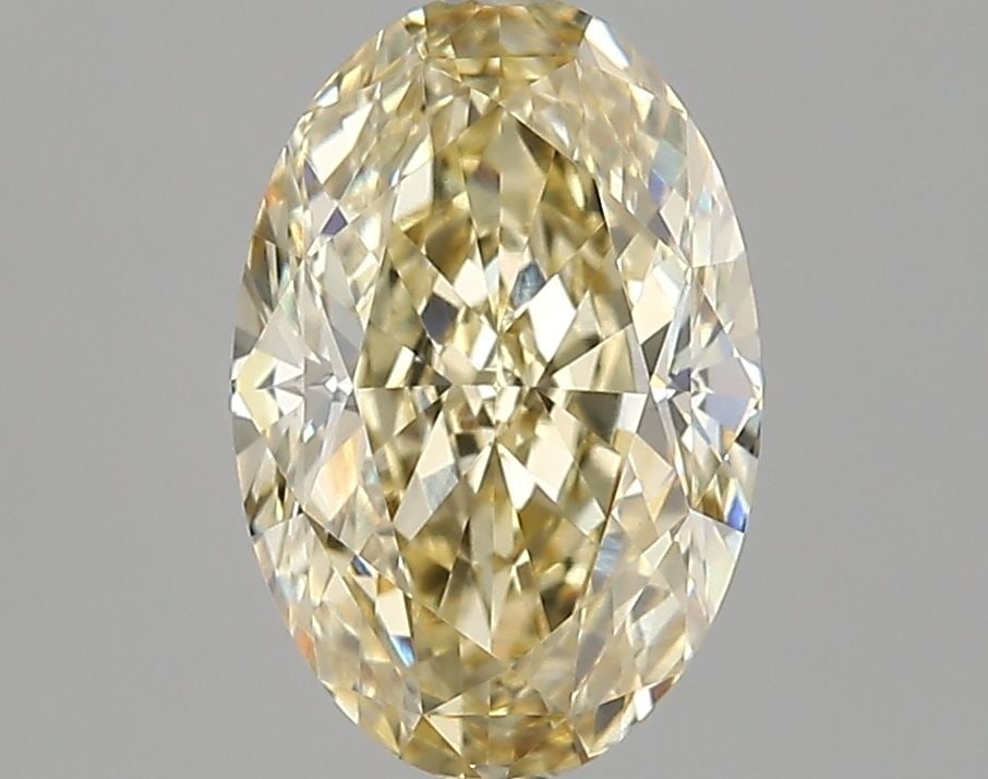 Loose Diamond - OVAL 2.71ct Fancy Light Yellow VVS2: Loose Diamond - OVAL 2.71ct Fancy Light Yellow VVS2 Source: This is a real non-mined Diamond that has been grown in a lab Shape: OVAL Carats: 2.71 Color: Fancy Light Yellow Certification: IGI Video: