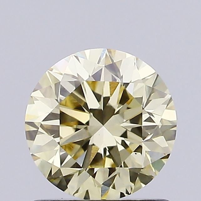 Loose Diamond - ROUND 0.9ct Fancy Light Yellow VS1: Loose Diamond - ROUND 0.9ct Fancy Light Yellow VS1 Source: This is a real non-mined Diamond that has been grown in a lab Shape: ROUND Carats: 0.9 Color: Fancy Light Yellow Certification: IGI Video: