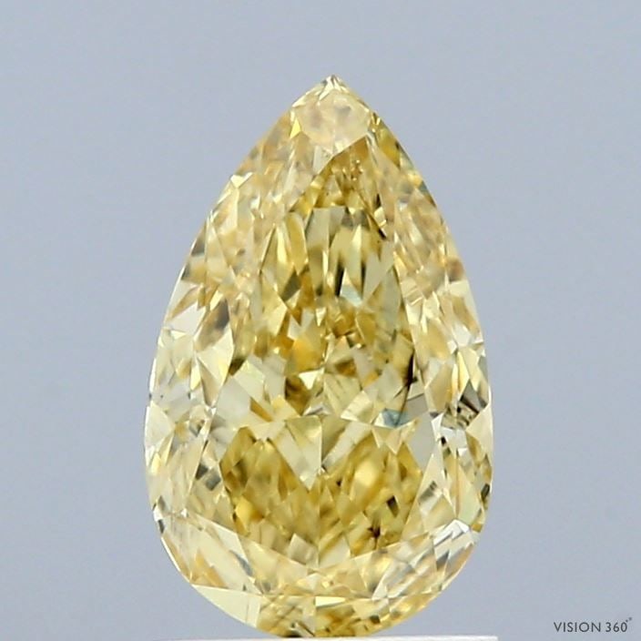 Loose Diamond - PEAR 1.57ct Fancy Vivid Yellow SI1: Loose Diamond - PEAR 1.57ct Fancy Vivid Yellow SI1 Source: This is a real non-mined Diamond that has been grown in a lab Shape: PEAR Carats: 1.57 Color: Fancy Vivid Yellow Certification: IGI The Diamo
