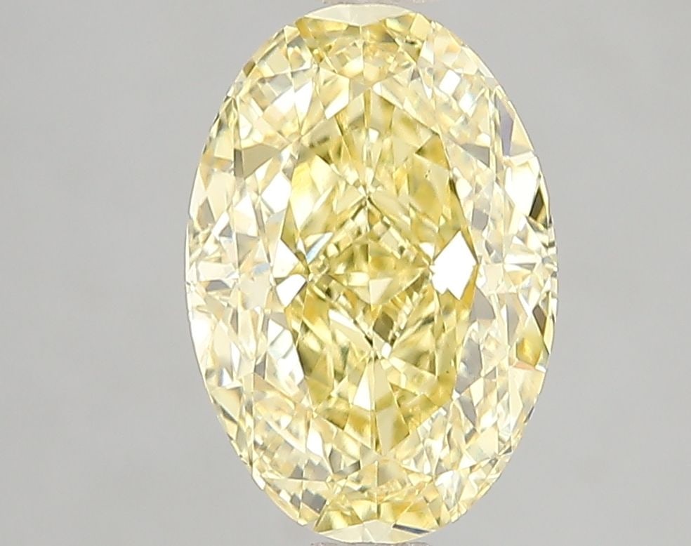 Loose Diamond - OVAL 3.02ct Fancy Vivid Yellow VS1: Loose Diamond - OVAL 3.02ct Fancy Vivid Yellow VS1 Source: This is a real non-mined Diamond that has been grown in a lab Shape: OVAL Carats: 3.02 Color: Fancy Vivid Yellow Certification: IGI Video: