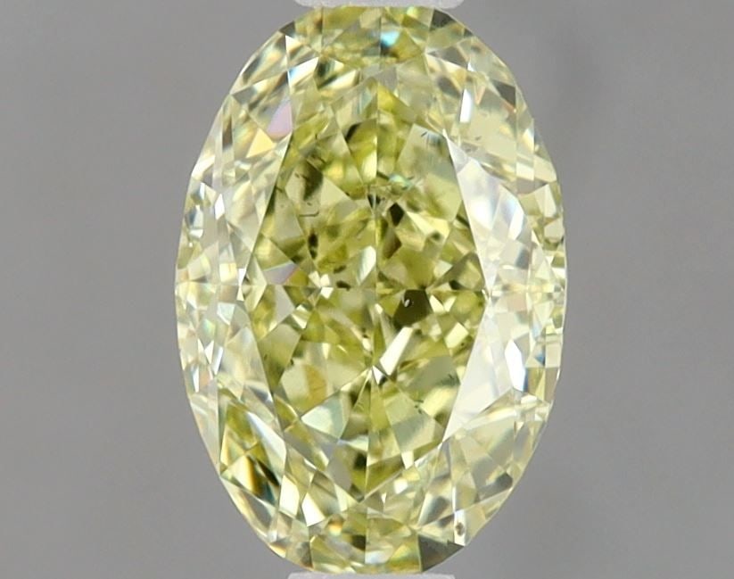 Loose Diamond - OVAL 0.8ct Fancy Yellow SI1: Loose Diamond - OVAL 0.8ct Fancy Yellow SI1 Source: Natural Shape: OVAL Carats: 0.8 Color: Fancy Yellow Certification: GIA Video: